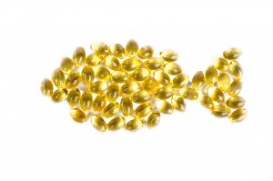 Fish oil capsules in fish shape